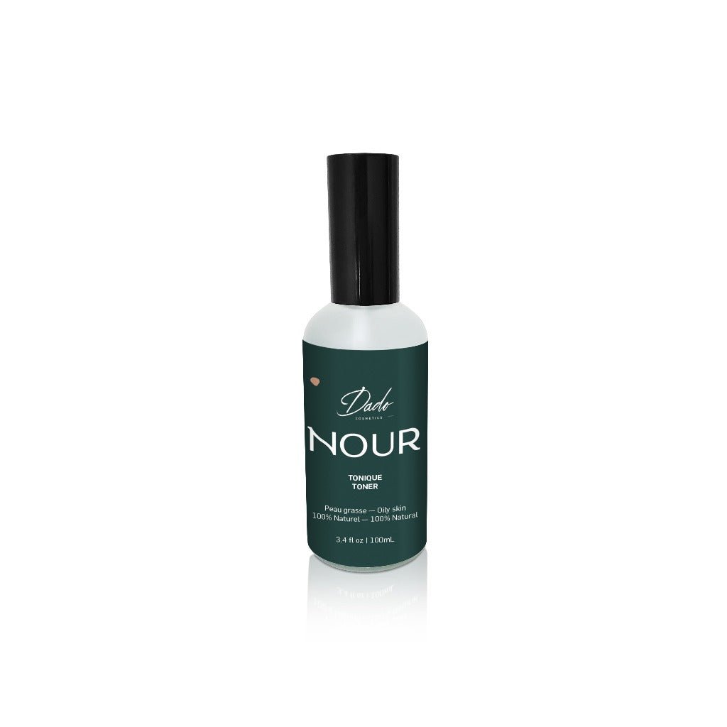 Un tonique visage peau grasse Nour dans un flacon en verre givré de 100 ml avec bouchon vaporisateur noir - Dado Cosmetics